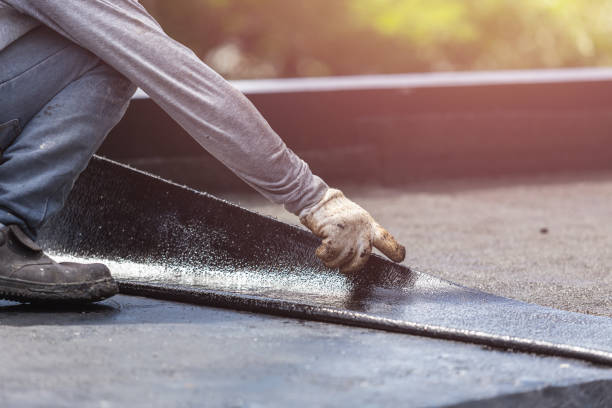 Professional Emergency Waterproofing technician working in Auburn, KY